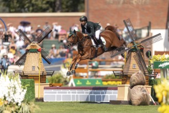 Yuri Mansur of Brazil, riding Cupfer, competes in the first round of the 2025 BMO Nations Cup
