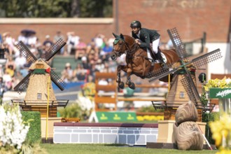 Yuri Mansur of Brazil, riding Cupfer, competes in the first round of the 2025 BMO Nations Cup