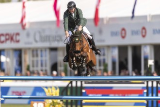 Jordan Coyle of Ireland, riding Chaccolino, competes in the first round of the 2025 BMO Nations Cup