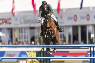 Jordan Coyle of Ireland, riding Chaccolino, competes in the first round of the 2025 BMO Nations Cup