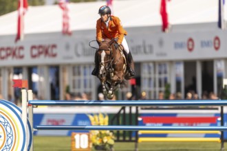 Willem Greve of the Netherlands, riding Pretty Woman Van't Paradujs, competes in the first round of