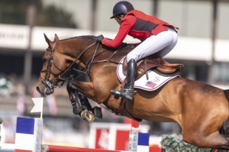 Laura Kraut of the USA, riding Tres Bien Z, competes in the first round of the 2025 BMO Nations Cup