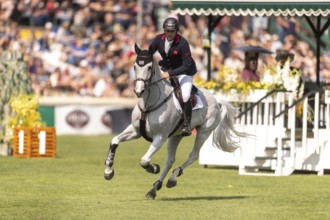 Donald Whitaker of Great Britain, riding Millfield Colette, competes in the first round of the 2025
