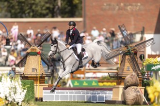Donald Whitaker of Great Britain, riding Millfield Colette, competes in the first round of the 2025