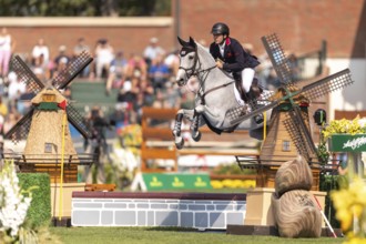 Donald Whitaker of Great Britain, riding Millfield Colette, competes in the first round of the 2025