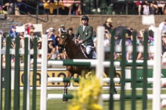 Jordan Coyle of Ireland, riding Chaccolino, competes in the first round of the 2025 BMO Nations Cup