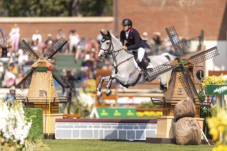 Donald Whitaker of Great Britain, riding Millfield Colette, competes in the first round of the 2025