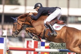 Joseph Stockdale of Great Britain, riding Ebanking, competes in the first round of the 2025 BMO