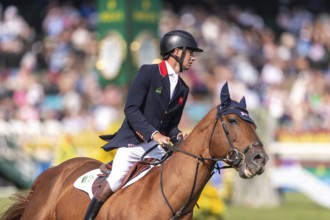 Joseph Stockdale of Great Britain, riding Ebanking, competes in the first round of the 2025 BMO