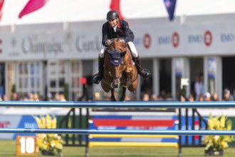 Joseph Stockdale of Great Britain, riding Ebanking, competes in the first round of the 2025 BMO