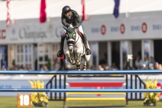 Luiz Felipe de Azevedo Neto of Brazil, riding Pandora Boy Z, competes in the first round of the