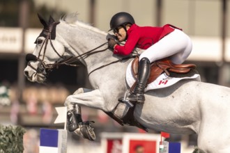 Susan Horn of Canada, riding, Dominka Van De Lucashoeve, competes in the first round of the 2025