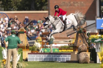 Susan Horn of Canada, riding, Dominka Van De Lucashoeve, competes in the first round of the 2025
