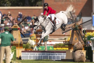Susan Horn of Canada, riding, Dominka Van De Lucashoeve, competes in the first round of the 2025