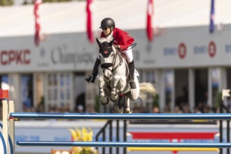 Susan Horn of Canada, riding, Dominka Van De Lucashoeve, competes in the first round of the 2025