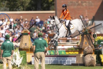 Kevin Jochems of the Netherlands, riding Camilla Van de Helle, competes in the first round of the