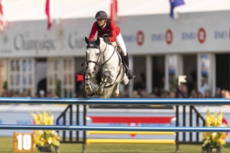 Katharina Rhomberg of Austria, riding Colestus Cambridge, competes in the first round of the 2025