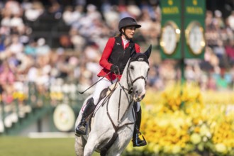 Katharina Rhomberg of Austria, riding Colestus Cambridge, competes in the first round of the 2025
