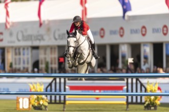 Katharina Rhomberg of Austria, riding Colestus Cambridge, competes in the first round of the 2025
