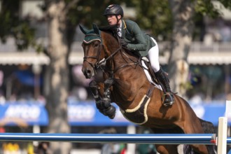 Daniel Coyle of Ireland, riding Legacy, competes in the first round of the 2025 BMO Nations Cup