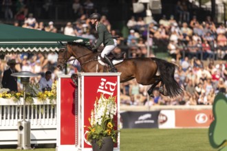 Daniel Coyle of Ireland, riding Legacy, competes in the first round of the 2025 BMO Nations Cup