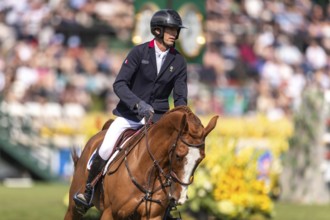 Kevin Staut of France, riding Queens Balou B, competes in the first round of the 2025 BMO Nations