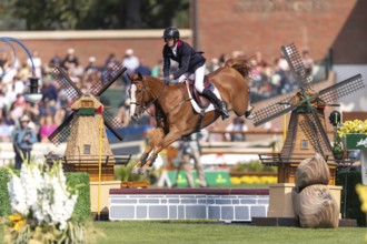 Kevin Staut of France, riding Queens Balou B, competes in the first round of the 2025 BMO Nations