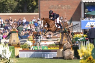 Kevin Staut of France, riding Queens Balou B, competes in the first round of the 2025 BMO Nations