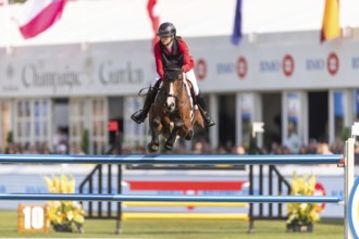 Sophie Hinners of Germany, riding Iron Dames Singclair, competes in the first round of the 2025 BMO