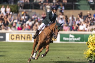 Gabriel De Matos Machado of Brazil, riding Nyles Van de Mottelhoeve, competes in the first round of