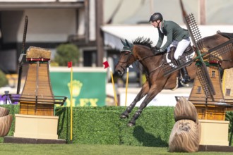 Daniel Coyle of Ireland, riding Legacy, competes in the first round of the 2025 BMO Nations Cup