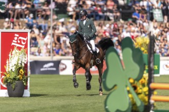 Daniel Coyle of Ireland, riding Legacy, competes in the first round of the 2025 BMO Nations Cup