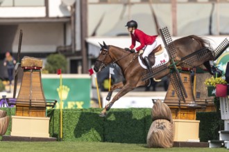 Tiffany Foster of Canada, riding Electrique, competes in the first round of the 2025 BMO Nations