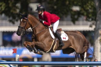 Tiffany Foster of Canada, riding Electrique, competes in the first round of the 2025 BMO Nations