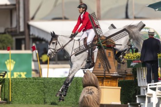Nicola Philippaerts of Belgium, riding Qnokke de Muze, competes in the first round of the 2025 BMO