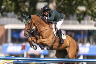 Gabriel De Matos Machado of Brazil, riding Nyles Van de Mottelhoeve, competes in the first round of