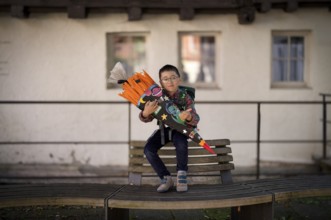 Boy, 6 years, glasses, multi-ethnic, on the day of enrolment in first grade of primary school,