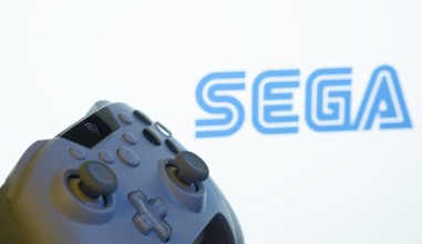 Dhaka, Bangladesh- 13 Sep 2025: A close-up of a gamepad with the Sega seen on screen in the