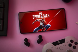 Dhaka, Bangladesh- 13 Sep 2025: A close-up of a gamepad with the Marvel's Spider Man seen on