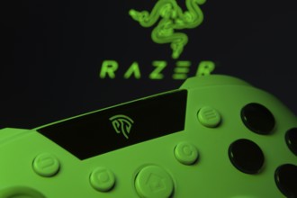 Dhaka, Bangladesh- 13 Sep 2025: A close-up of a gamepad with the Razer seen on screen in the