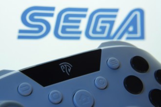 Dhaka, Bangladesh- 13 Sep 2025: A close-up of a gamepad with the Sega seen on screen in the
