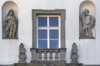 West façade with window and two stone figures, New Castle in Kisslegg, Allgäu, Baden-Württemberg,