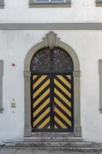 West façade with wooden gate and iron grille, New Castle in Kisslegg, Allgäu, Baden-Württemberg,