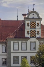 Detail, west façade with two wooden gates and stork's nest, New Castle in Kisslegg, Allgäu,