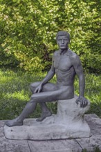 Male sculpture, bronze copy, title Wäcnter, by WLHELM RIEDISSER, in the castle park in Kisslegg,
