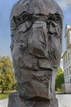 New castle with wooden sculpture by Klaus Prior in Kisslegg, Allgäu, Baden-Württemberg, Germany