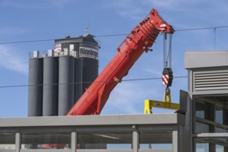 Mobile crane with telescopic boom and silos for concrete products in Kisslegg, Allgäu,