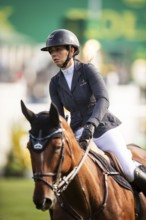 Alessandra Reich of Austria, riding Oeli R, competes in the 2025 Spruce Meadows Masters on