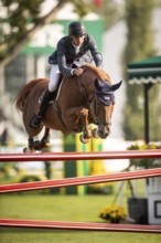 Joseph Stockdale of Great Britain, riding Ebanking, competes in the 2025 Spruce Meadows Masters on