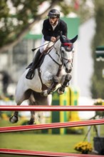 Roy Van Beek of Austria, riding Cavoiro-H Old, competes in the 2025 Spruce Meadows Masters on